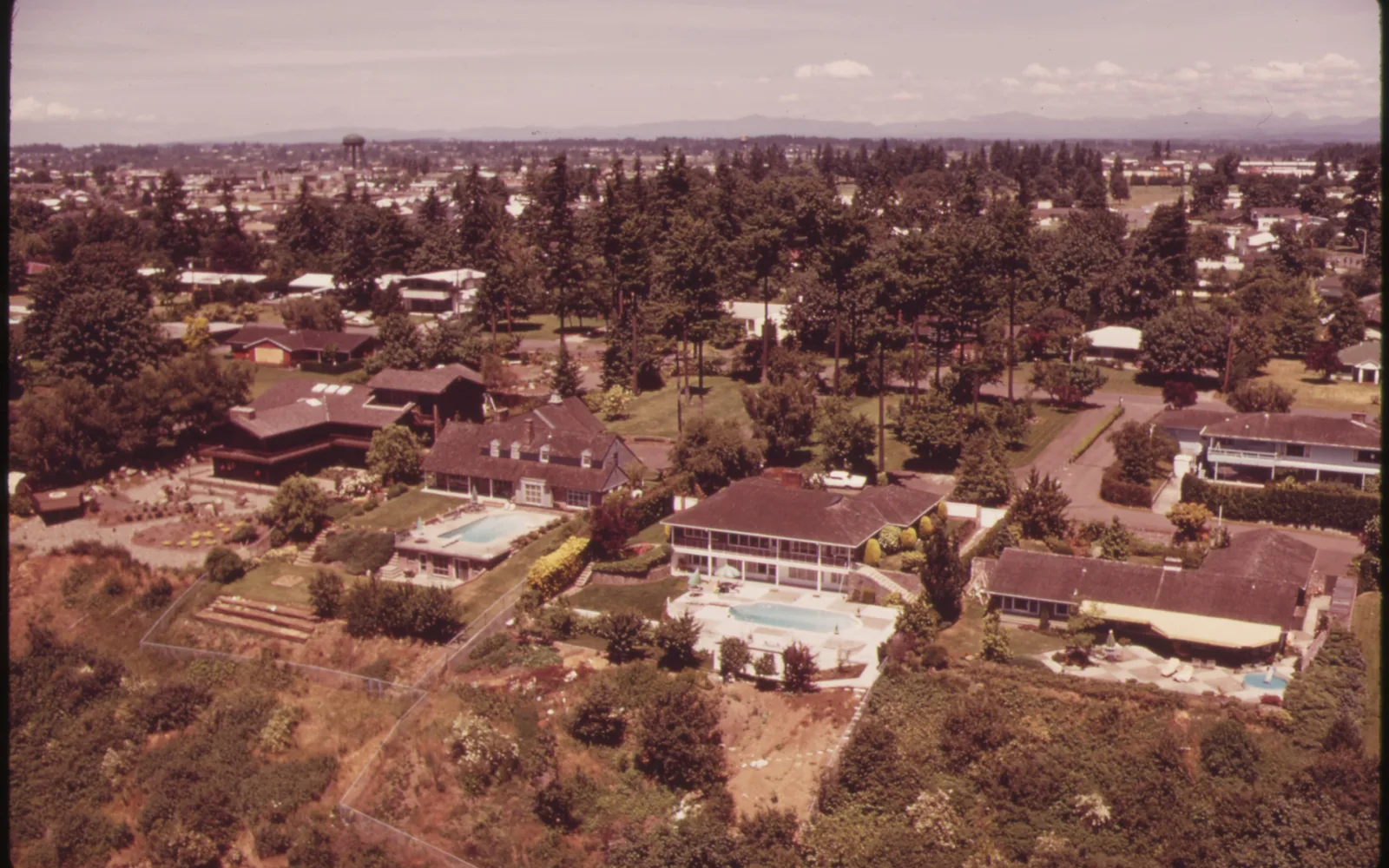 Aerial view of residential neighborhood houses, photographed in 1973